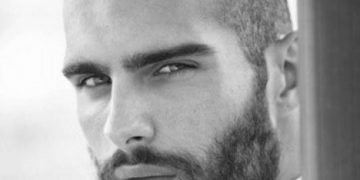 Foto von modischen Haarschnitten mit Bart